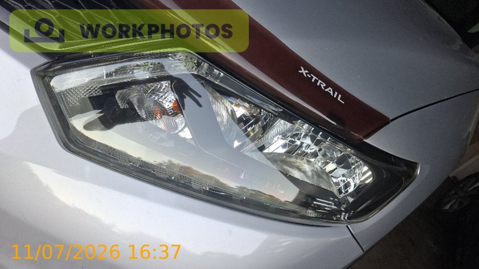 After photo of restored Nissan X-Trail headlight after restoration with date stamp visible